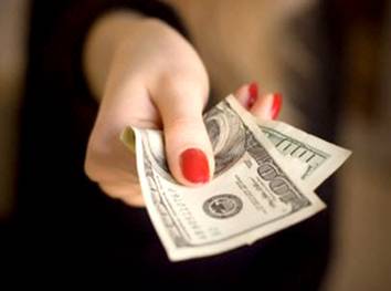 03 Woman Handing Money